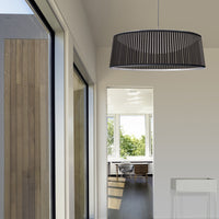 Black pleated pendant lamp with a sleek, modern design, adding texture and elegance to contemporary interiors.