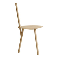 Light wood chair with a smooth finish and minimalist design, featuring natural grain patterns. 