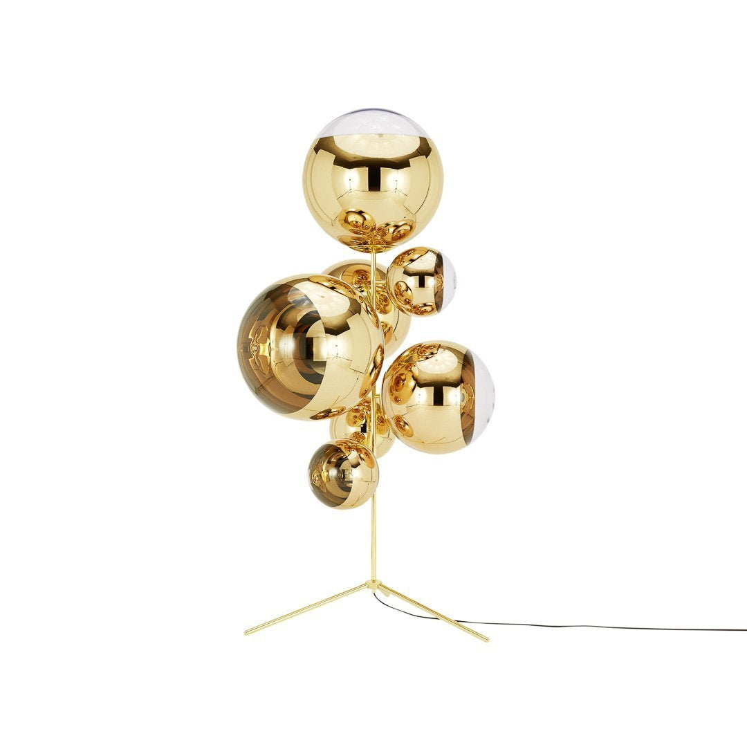 Gold metallic lamp with spherical shapes, featuring a polished finish that reflects light beautifully.