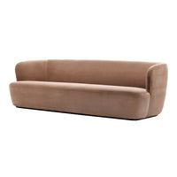 Soft beige velvet sofa with smooth, clean lines and a contemporary, minimalist design.