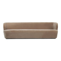 Soft beige velvet sofa with a sleek, minimalist design, perfect for modern interiors.