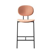 Pink upholstered bar stool with a sleek black metal frame, featuring a minimalist design.