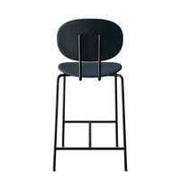 Modern black bar stool with a sleek, rounded dark green seat and minimalist metal frame design. Perfect for contemporary spaces.
