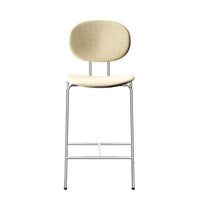Beige upholstered bar stool with a smooth, rounded back and sleek metal legs, perfect for modern decor.
