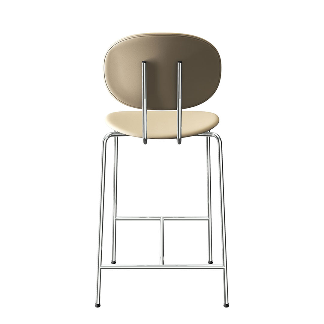 Beige and tan bar stool with a sleek chrome frame and smooth, rounded backrest. Modern, minimalist design.