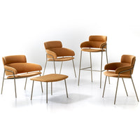 Set of modern chairs and table in warm orange upholstery with sleek metallic legs, showcasing a minimalist design.