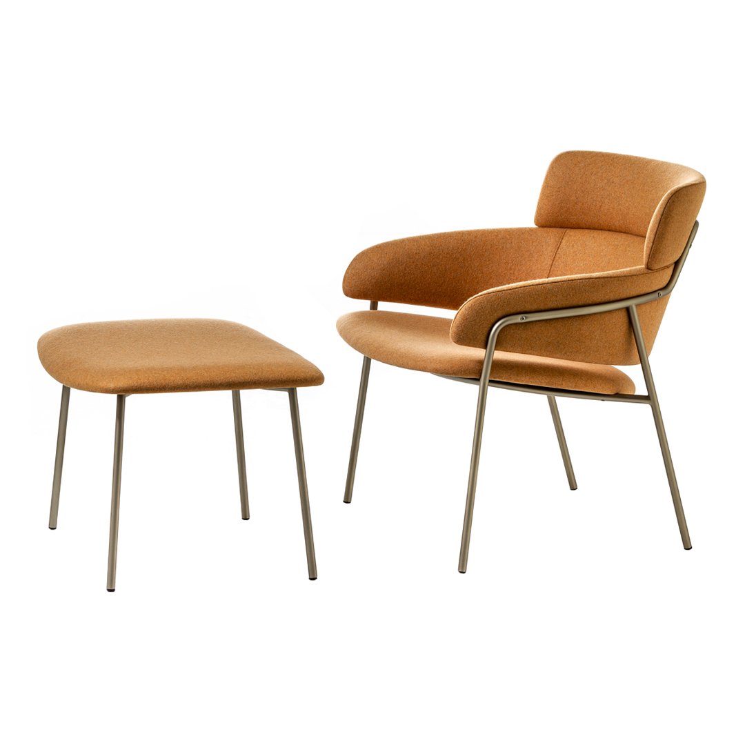 Modern rust-colored armchair and ottoman set with a smooth fabric finish and minimalistic metal legs.