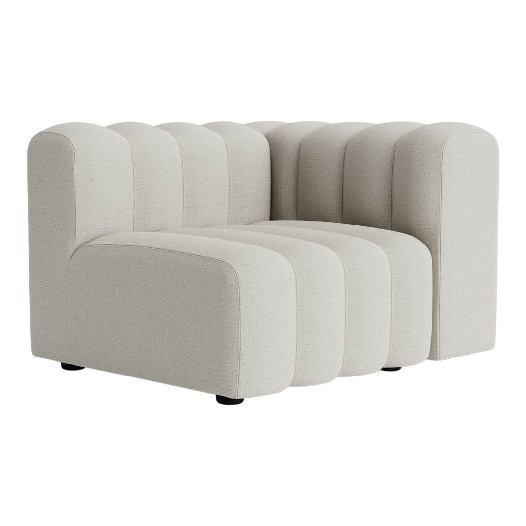 Cream-colored upholstery sofa with a ribbed pattern and rounded edges, perfect for modern interior decor.