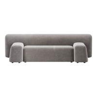 Stylish gray velvet sofa with a minimalistic design and smooth, curved edges for modern decor.