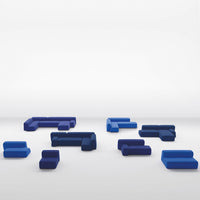 Modern modular sofa in various shades of blue, featuring vibrant tones and geometric shapes.