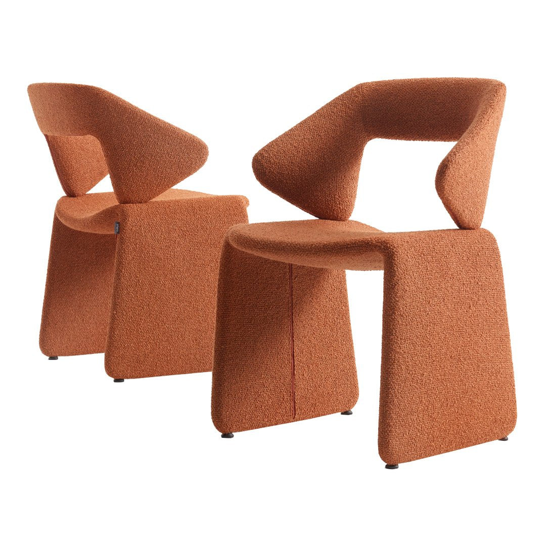 Contemporary orange textured chairs with unique geometric design and minimalist style. Perfect for modern decor.