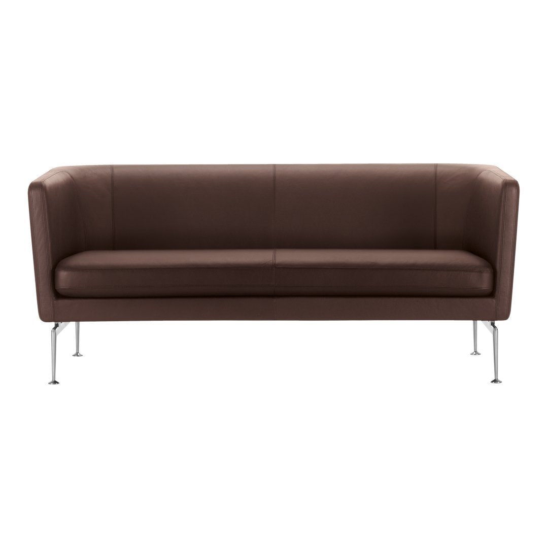 Brown leather sofa with sleek lines and chrome legs, featuring a minimalist design and smooth, solid color.