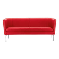 Bold red leather sofa with clean lines and sleek chrome legs, perfect for modern interiors.