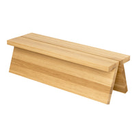 Natural bamboo bench with a sleek, minimalist design in light beige tones and smooth wooden textures.