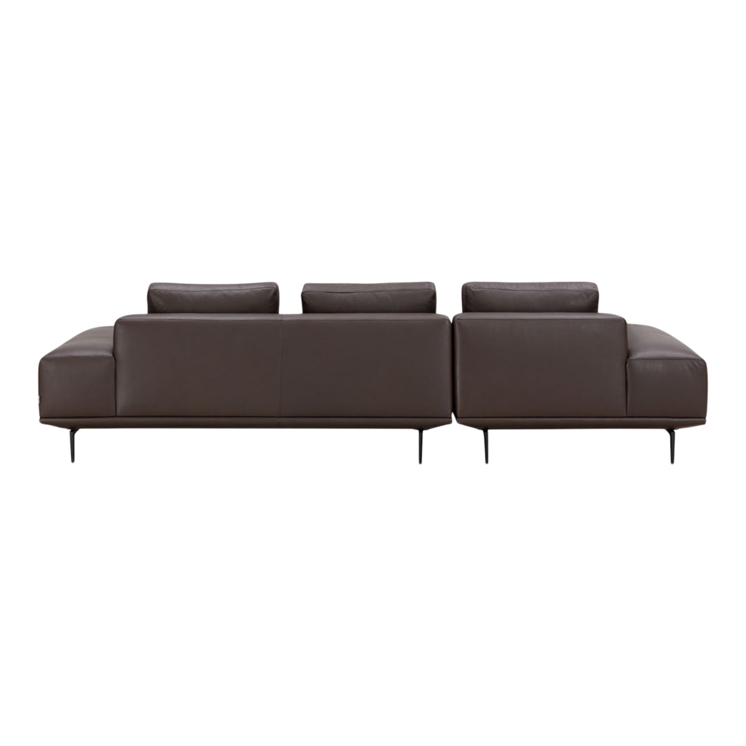 Modern brown leather couch with sleek lines and minimalist design, featuring smooth textures and angled metal legs.