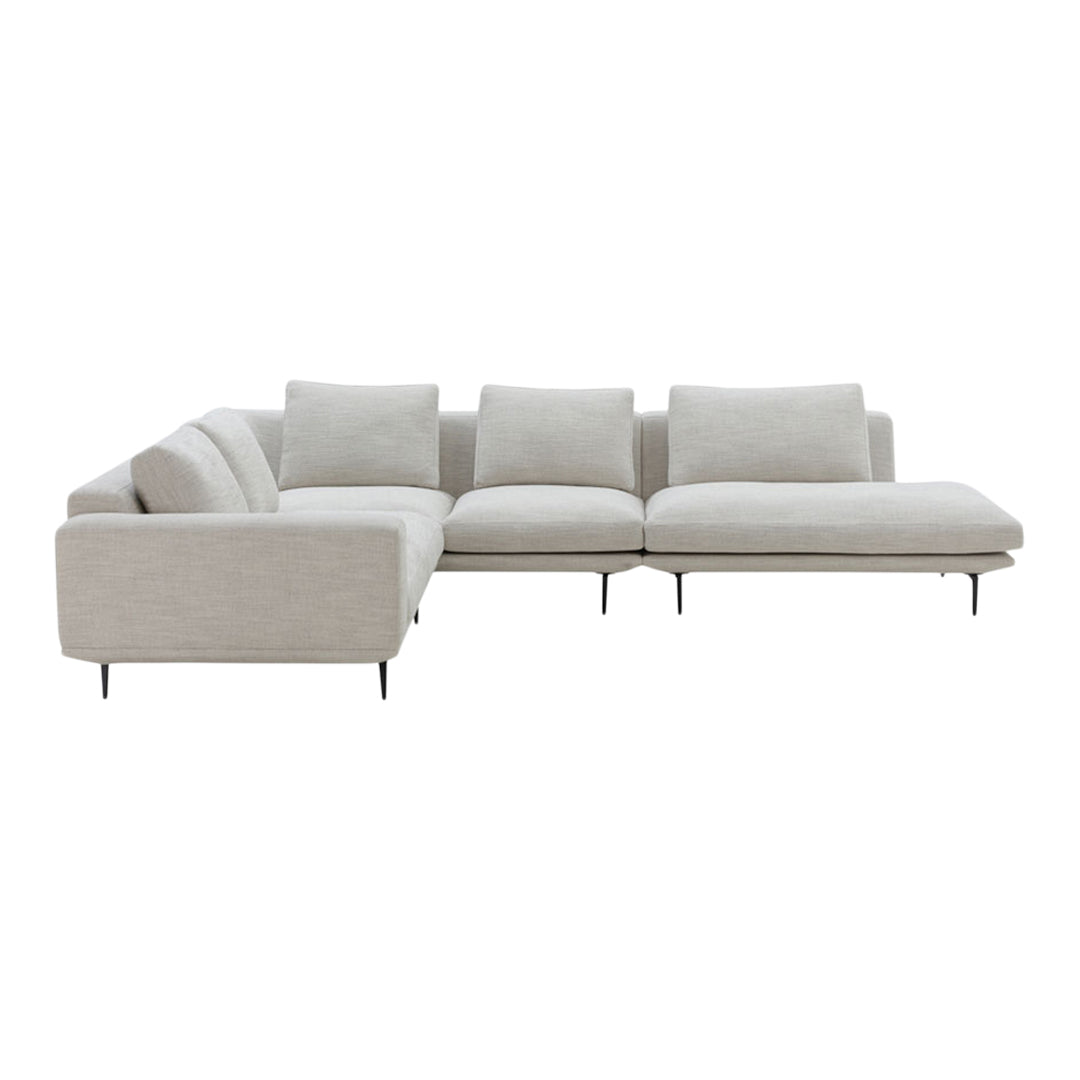Light beige sectional sofa with smooth upholstery and minimalist design, featuring subtle texture and clean lines.