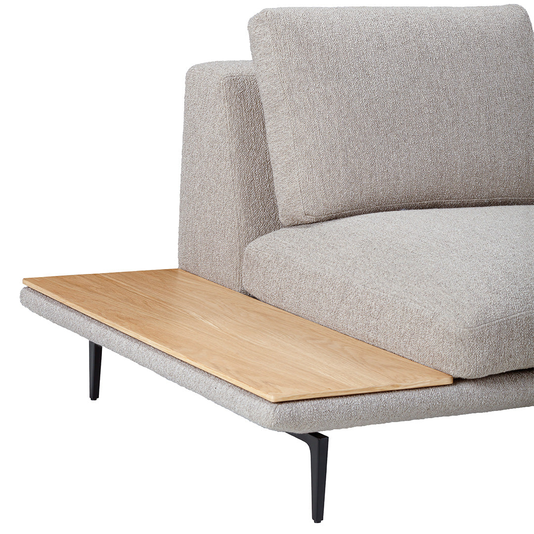 Light gray textured upholstery with a natural wood accent table and black metal legs. Modern and minimalist design.