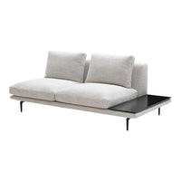 Light gray upholstered sofa with subtle texture and sleek black side table, featuring minimalist design.