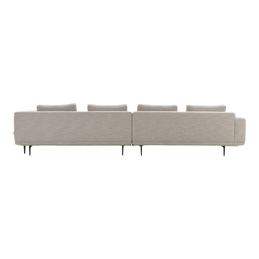 Light beige modern sectional sofa with textured fabric and sleek black legs, ideal for contemporary living spaces.
