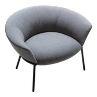 Gray upholstered lounge chair with a curved design and sleek black metal legs. Simple, modern, and stylish.