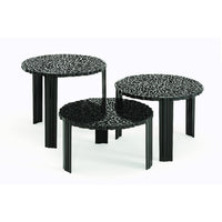 Set of three chic coffee tables featuring black textured surfaces with a modern leopard print design.