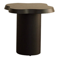 Black abstract side table with an organic shape and smooth surface, showcasing a minimalist design.