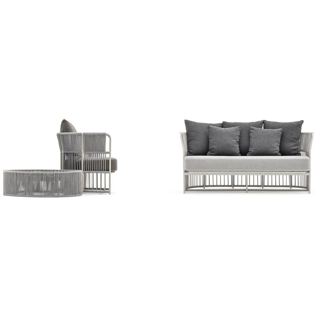 Gray upholstered sofa set with a modern design, featuring sleek, geometric patterns and soft cushions.