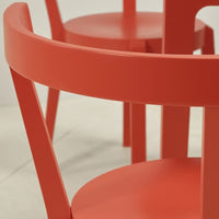Vibrant orange wooden chair with a smooth finish and modern design, featuring a simple, clean pattern.