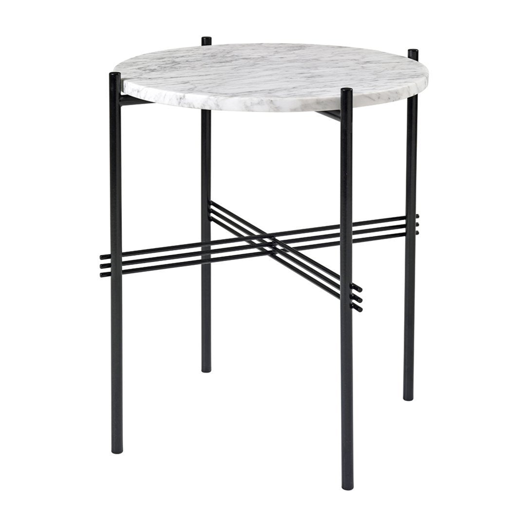 Round marble top side table with a sleek black metal base and intersecting wire design.