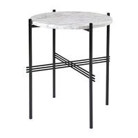 Round marble top side table with a sleek black metal base and intersecting wire design.