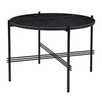Circular black marble table with sleek black metal legs and geometric cross pattern for modern decor.