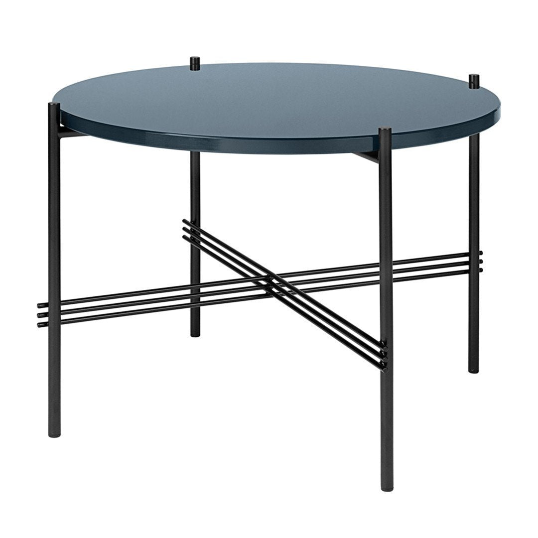Round dark blue table with a sleek black metal frame and stylish crisscross pattern. Modern design for home decor.