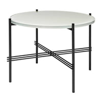 Round white glass table with sleek black metal legs and geometric crossbar design. Modern and minimalist aesthetic.