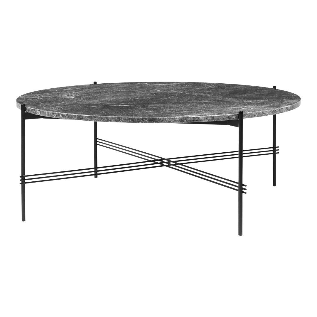 Round black marble coffee table with sleek metal legs, featuring a minimalistic geometric pattern.