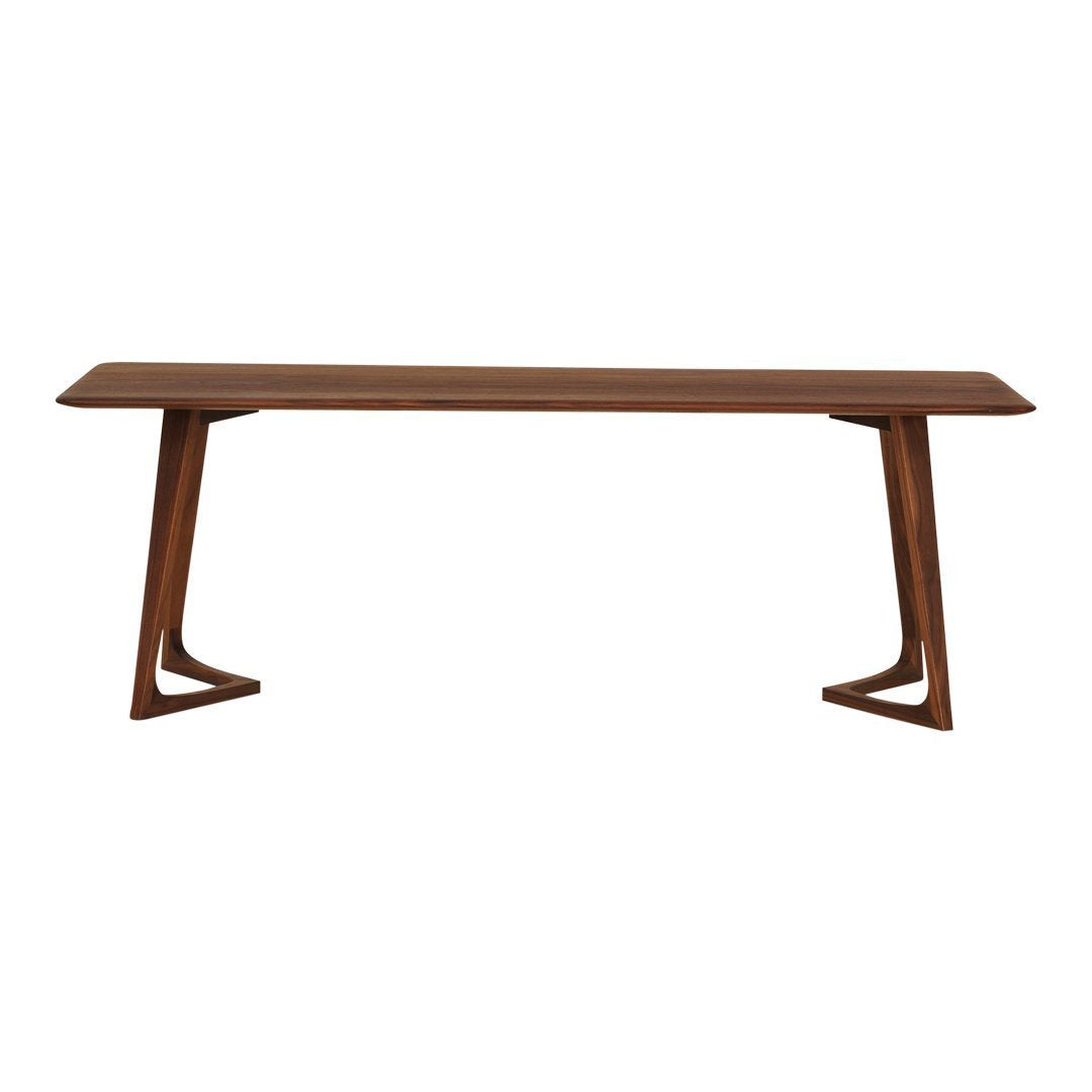 Wooden dining table in rich brown finish with a sleek, modern design and unique triangular legs.