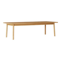 Light oak wood dining table with a smooth finish and clean, minimalist design. Ideal for modern interiors.
