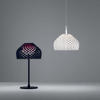 Black and white mesh-patterned lamps featuring textured designs in a contemporary setting.