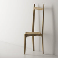 Minimalist wooden chair in natural light wood color with sleek, modern design and smooth finish.