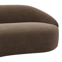 Smooth brown upholstery with a sleek, rounded design, perfect for modern interiors.