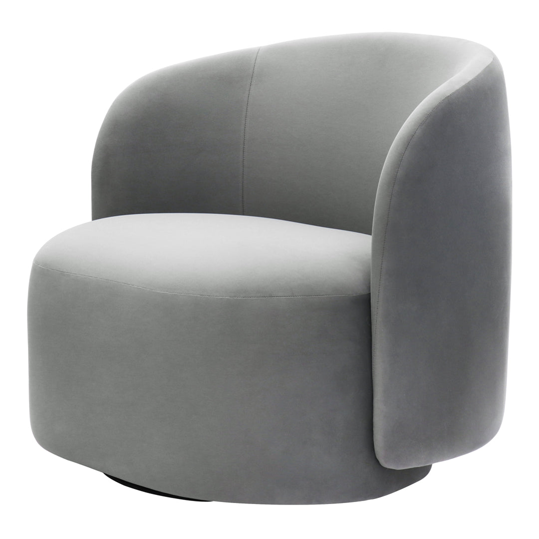 Soft gray velvet armchair with a smooth, modern design and rounded edges. Perfect for contemporary decor.