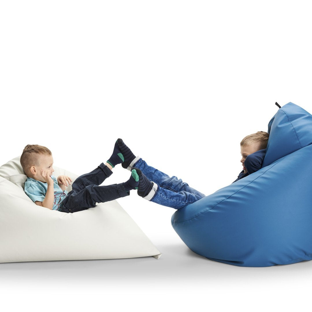 Children playing on a white and blue bean bag chair, featuring solid colors and smooth, sleek surfaces.
