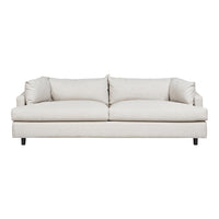 Cream-colored upholstered sofa with a smooth, minimalist design and plush, soft cushions. Perfect for modern interiors.
