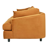 "Side view of a modern sofa in warm orange fabric with soft, textured cushions and sleek black legs."