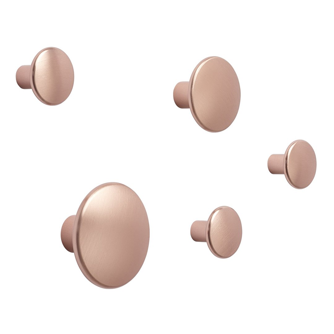 Set of rose gold circular knobs in varying sizes, featuring a sleek and smooth metallic finish.