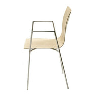 Light beige chair with a sleek, minimalist design and a silver, modern metal frame.