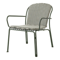 Green metal chair with a woven seat and back in a geometric pattern of gray, black, and cream.