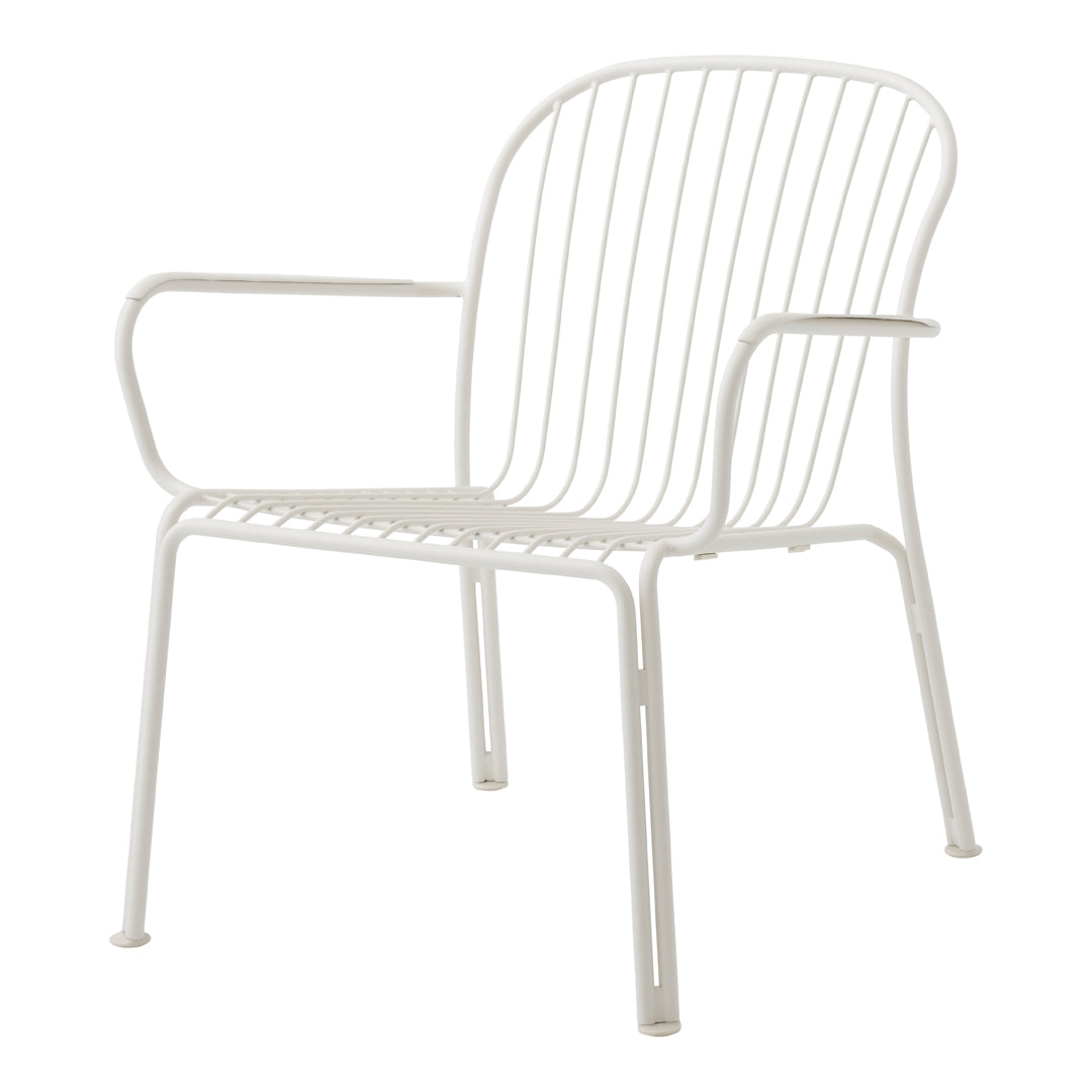 White metal chair with sleek slatted design and minimalist aesthetic, perfect for modern outdoor or indoor settings.