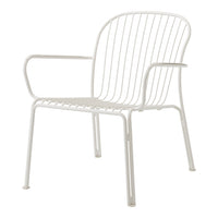 White metal chair with sleek slatted design and minimalist aesthetic, perfect for modern outdoor or indoor settings.