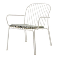 White metal chair with a striped green and black cushion, featuring a modern, minimalist design.
