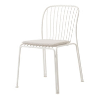 White wire chair with a simple design and a soft, neutral cushion. Ideal for modern and minimalist decor.